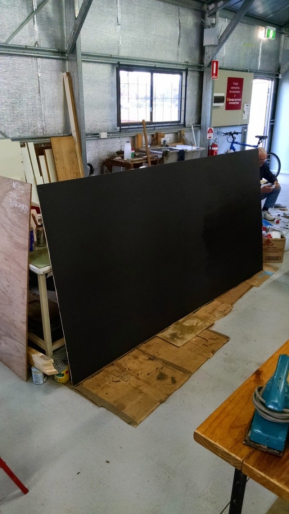 Photo of blackboard under construction.